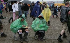 People sitting in rain po 008