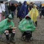 People sitting in rain po 008